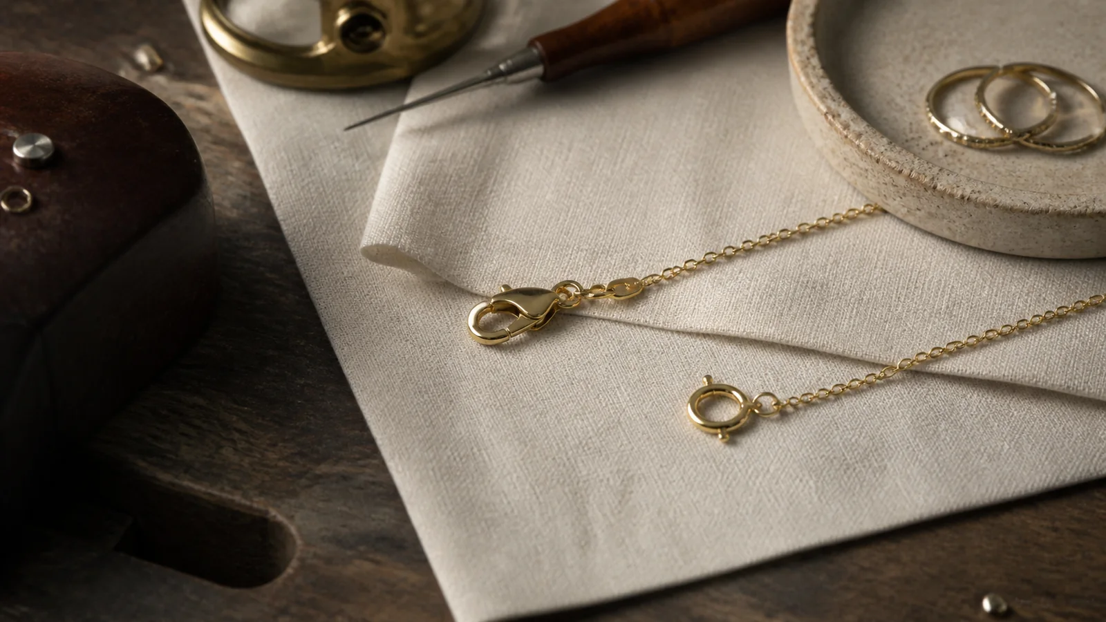 Editorial still life for Lobster Clasp vs Spring-Ring Clasp: Handling, Scale and Replacement