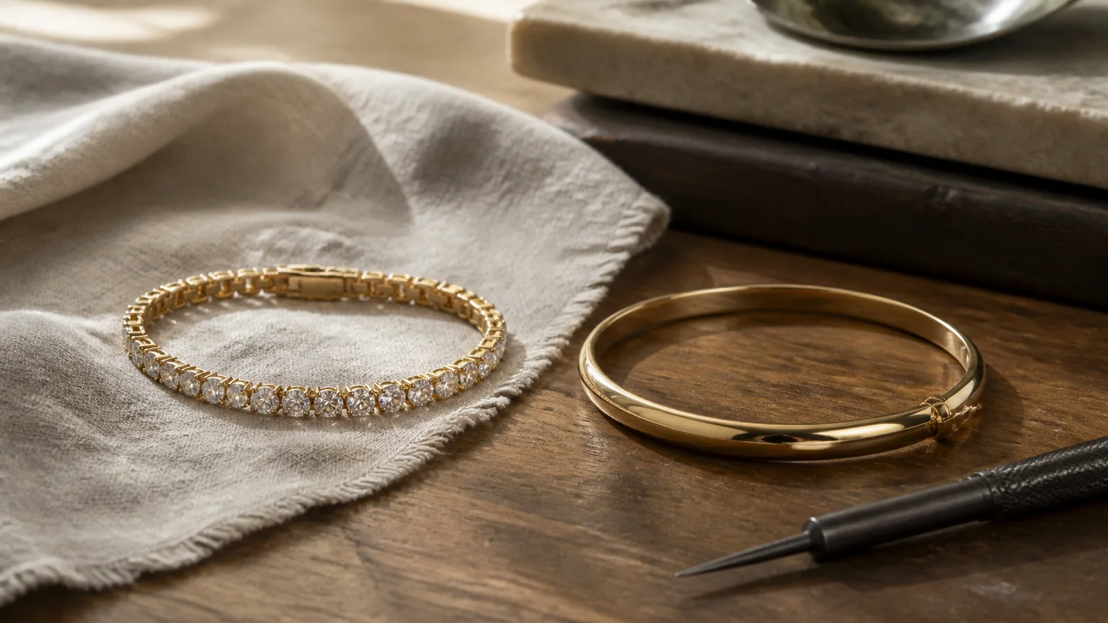 Editorial still life for Tennis Bracelet vs Gold Bangle: Movement, Sizing and Setting Risk
